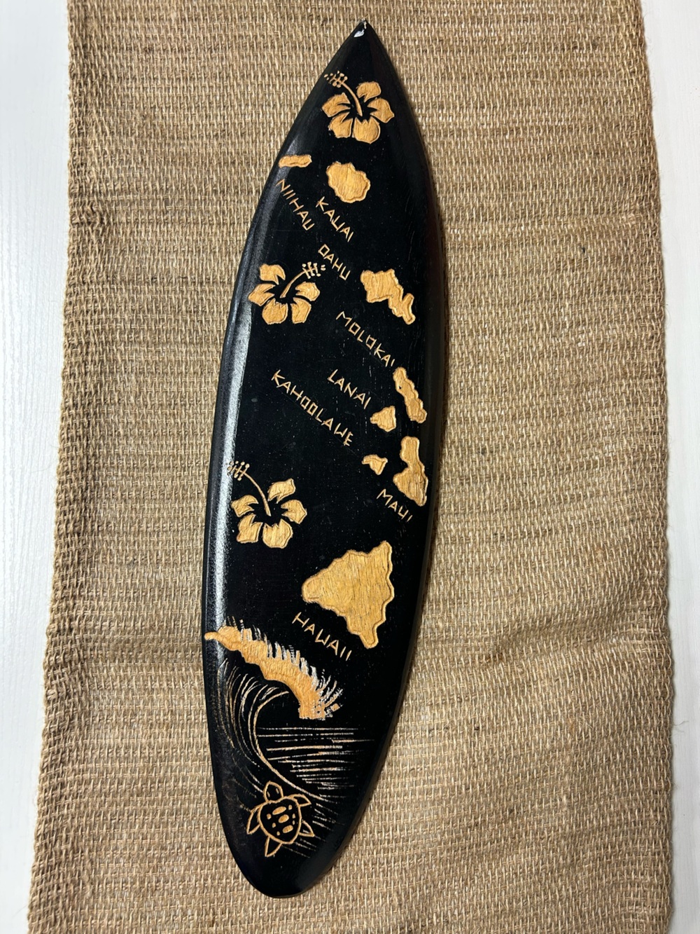 Black and Gold Hawaiian Surfboard Wall Accent